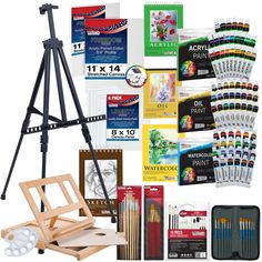 an easel with paint, pencils and other art supplies