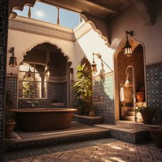 a large bath tub sitting in the middle of a room next to potted plants