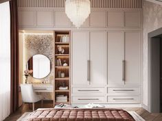 a bedroom with white cabinets and a large mirror on the wall next to a bed