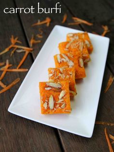 carrot burf with almonds on a white plate