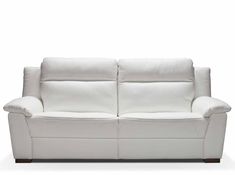 a white leather couch sitting on top of a hard wood floor