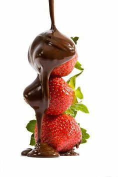 chocolate covered strawberries stacked on top of each other