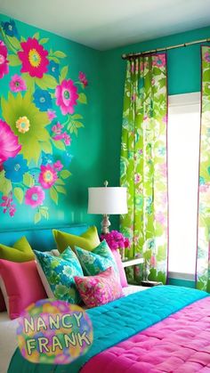 a bedroom decorated in bright colors with flowers painted on the walls and bed linens