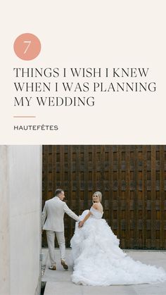 a bride and groom holding hands in front of a wooden fence with the words 7 things i wish i knew when i was planning my wedding