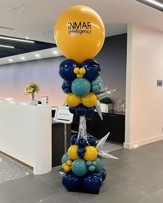 a bunch of balloons that are on top of each other