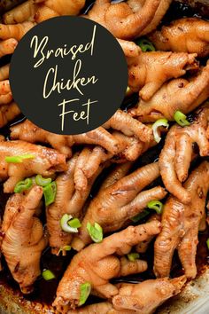 cooked chicken feet are in a pan with sauce and green onions on the side that says bronzed chicken feet