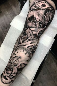 a man with a clock and roses tattoo on his arm