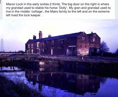 an old brick building sitting next to a body of water