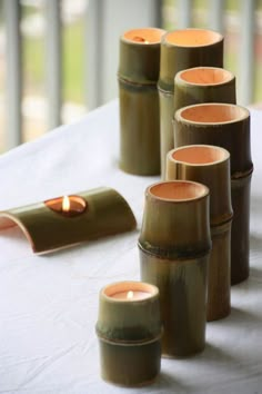 some candles are sitting on a table