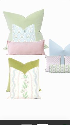 four pillows with bows on them in different colors and sizes, including pink, blue, green