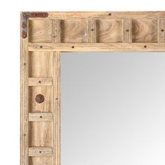 a mirror that is made out of wood