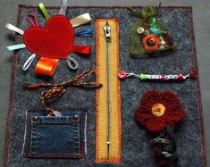 there are many items on the table to be made out of felt and yarns