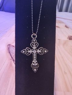 Embrace timeless beauty with this vintage-inspired 18" Crystal Cross Necklace. Featuring a stunning cross pendant adorned with sparkling crystals, this necklace blends classic charm with modern elegance. Whether worn casually or for special occasions, it adds a touch of grace and inspiration to any ensemble, making it an essential piece for your jewelry collection. Shop all our Jewelry Here. https://designsbyrobthomas.etsy.com #Jewelry #Necklace #VintageJewelry #CrystalCrossNecklace #FashionStatement #UniqueJewelry #StylishAccessories #ElegantDesign #Inspirational #TrendyJewelry Viking Cross, Cross Chain Necklace, Goth Necklace, Silver Cross Necklace, Necklace Cross, Crystal Cross, Cross Chain, Saint Augustine, Sparkling Crystal