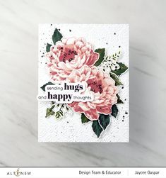 a close up of a card with flowers on it and the words hugs and happy thoughts