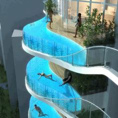 two people are swimming in a pool next to a tall building with glass balconies