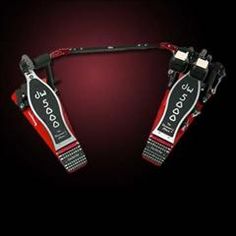 two red and black pedals with the words speed doctor written on them in white letters