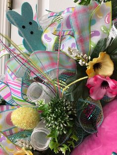 a close up of a wreath with flowers on it