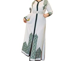 stunning  Moroccan white bridal  Takshita  this authentic royal  Moroccan dress is very comfortable and elegant and will turn heads at any occasion. ' Elegant Tunic Dress With Intricate Embroidery, White Resham Embroidered Gown For Eid, White Gown With Resham Embroidery For Eid, Traditional White Formal Gown, Elegant Thobe With Intricate Embroidery For Eid, White Floor-length Gown With Dabka Work, Elegant Long Abaya With Resham Embroidery, Elegant White Gown For Eid, White Long Sleeve Thobe For Formal Occasions