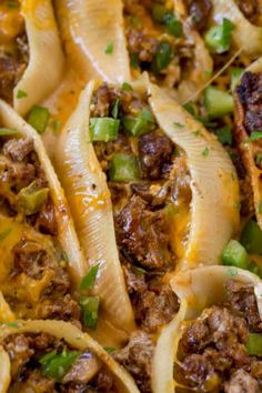 some pasta shells with meat and green onions