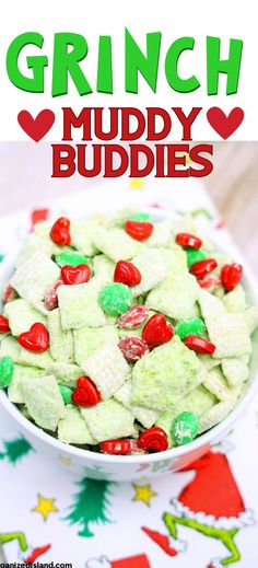 a white bowl filled with green and red candy candies on top of a table