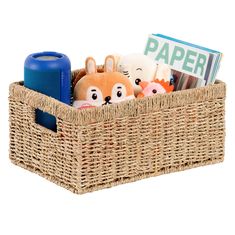 a basket filled with stuffed animals and books