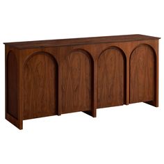 the sideboard is made from wood and has arched doors