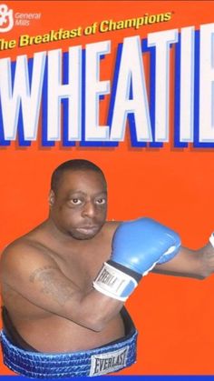 a magazine cover with a man wearing blue boxing gloves on the front and an orange background