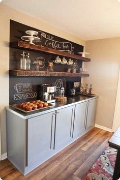 a coffee bar with chalkboard on the wall