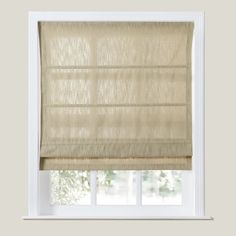 a beige roman blind in front of a window