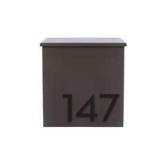 a black mailbox with the number fourteen on it