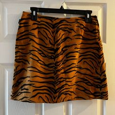 Vintage Moschino Tiger Stripe Mini Skirt. Size 10, Excellent Condition. Send Me An Offer! I Love This Skirt, But It’s Slightly Too Small For My Waist. Incredible Quality And So Flattering. Tiger Print Skirt, Vintage Moschino, Print Mini Skirt, Tiger Stripes, Print Skirt, Tiger Print, Black Orange, Printed Skirts, Costume Party