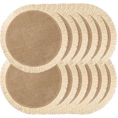 four round rugs with fringe on the bottom and one circle in the middle, all made out of jute