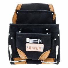 the back side of a black and tan bag with two pockets on each side that has a name tag attached to it