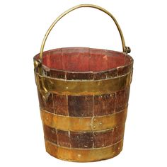 an old wooden bucket with metal handles