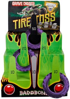 three green and purple toys in a display case with numbers on the front, one for each