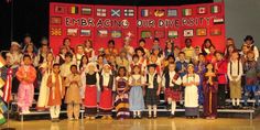 a group of people standing on top of a stage