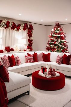 a living room decorated for christmas with red and white decor