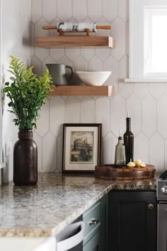 the kitchen counter is clean and ready to be used as a cooking area for entertaining