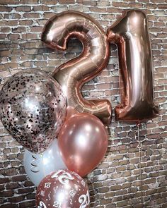 some balloons are in the shape of letters and numbers