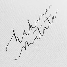 the word marriage written in cursive writing on a white paper with black ink