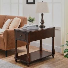 a living room scene with focus on the end table and couch in the foreground