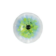 an image of a flower in the center of a glass bowl on a white background