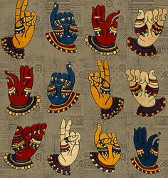 many different colored hand gestures on a brown background