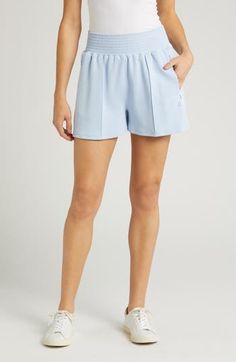 Stay in, work out and make an easy-breezy transition to leisure time in these flowy shorts made from stretchy, lightweight fabric. 3" inseam; 30" leg opening; 14" front rise; 17" back rise (size Medium) 54% polyester, 40% modal, 6% elastane Dry clean or machine wash, dry flat Imported Spring High-waisted Shorts Activewear, Blue Athletic Shorts With Built-in Shorts For Leisure, Sporty Pajama Shorts With Short Inseam, Sporty Pajama Shorts With Short Inseam And Elastic Waistband, Leisure Athletic Shorts With Built-in Shorts, Leisure Shorts With Elastic Waistband, Summer Leisure Shorts With Comfort Waistband, Sporty Pajama Shorts With Elastic Waistband, Sporty Pajama Shorts For Spring