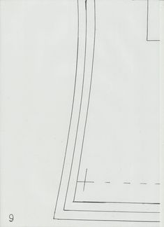 a drawing of a long curved line on white paper