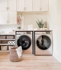 a washer and dryer in a small room