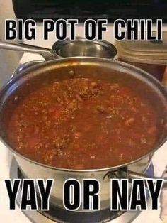 a big pot of chili sitting on top of a stove