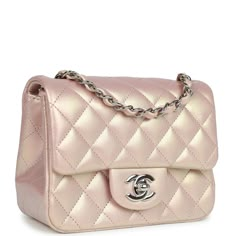 This Mini Square flap bag is in pink iridescent lambskin with silver tone hardware and has a front flap with signature CC turnlock closure, rear half moon pocket and single interwoven pink leather and silver tone chain link shoulder/crossbody strap.Delivery 5-8 or 10-15 working days Please note that during high season and Sale period, delivery times may be affected We accept payment with a Credit card, Debit card, or PayPal.Note: Our Items are totally New High quality Brand Inspired Refurbished. Elegant Iridescent Bags, Pink Chanel Bag, Chanel Mini Square, Me Bag, Chanel Box, Pink Iridescent, Chanel Mini, Pink Chanel, Chanel Bags