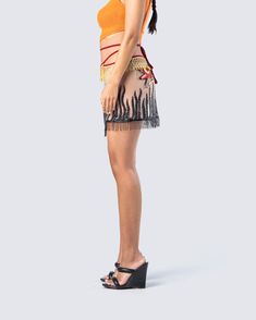 If you obey all the rules, you miss all the fun 😜 Show off your free-spirited side in this mesh wrap-around tie mini skirt designed with a tassel hem and embroidered patch detailing 🔥 Leave little to the imagination -- skirt is sheer & undergarments are not included Fuzzy Skirt, White Corset Dress, Denim Pleated Skirt, Mesh Mini Skirt, Vegan Leather Skirt, Red Mini Skirt, Chain Dress, Orange Satin, Flare Jumpsuit