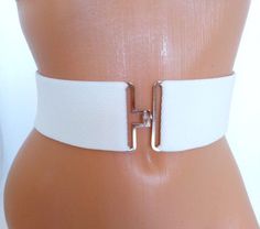 "White elastic waist belt, with silver metal buckle The belt is elastic so it fits perfectly every size and shape. Silver metal buckle is very stylish and elegant, combined with modern white belt gives you a perfect timeless and polished look. It is one-of-a-kind belt which gives your outfit that perfect, unique look. Powerful and fantastic, yet simple and elegant, it is super easy to wear. Wide: 2.30 inch / 6 cm BEFORE ORDERING *Just measure the right spot you want to wear it (around your waist Modern White Belt For Formal Occasions, Modern White Formal Belt, Adjustable White Belt For Summer, White Adjustable Belt For Summer, White Fabric Belt For Summer, White Adjustable Fabric Belt, Leather Obi Belt, Deep Red Dress, Belt Corset